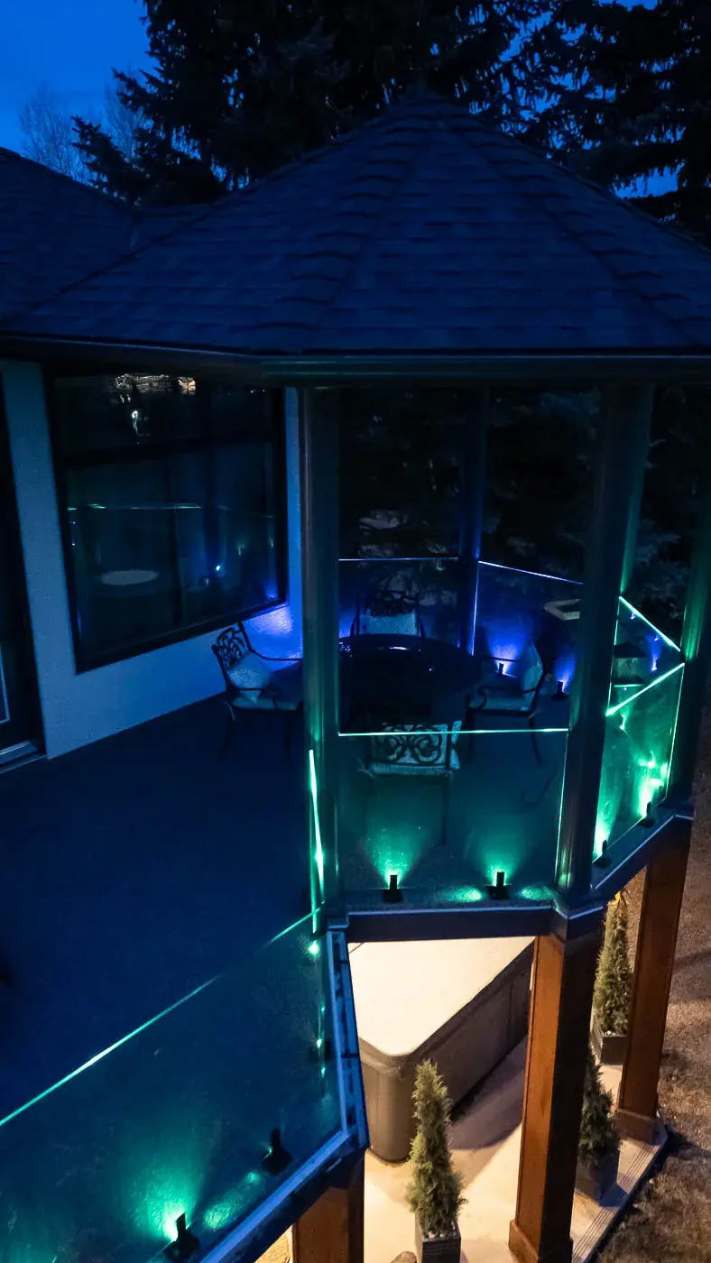 Drone shot of frameless glass railing around an outdoor patio