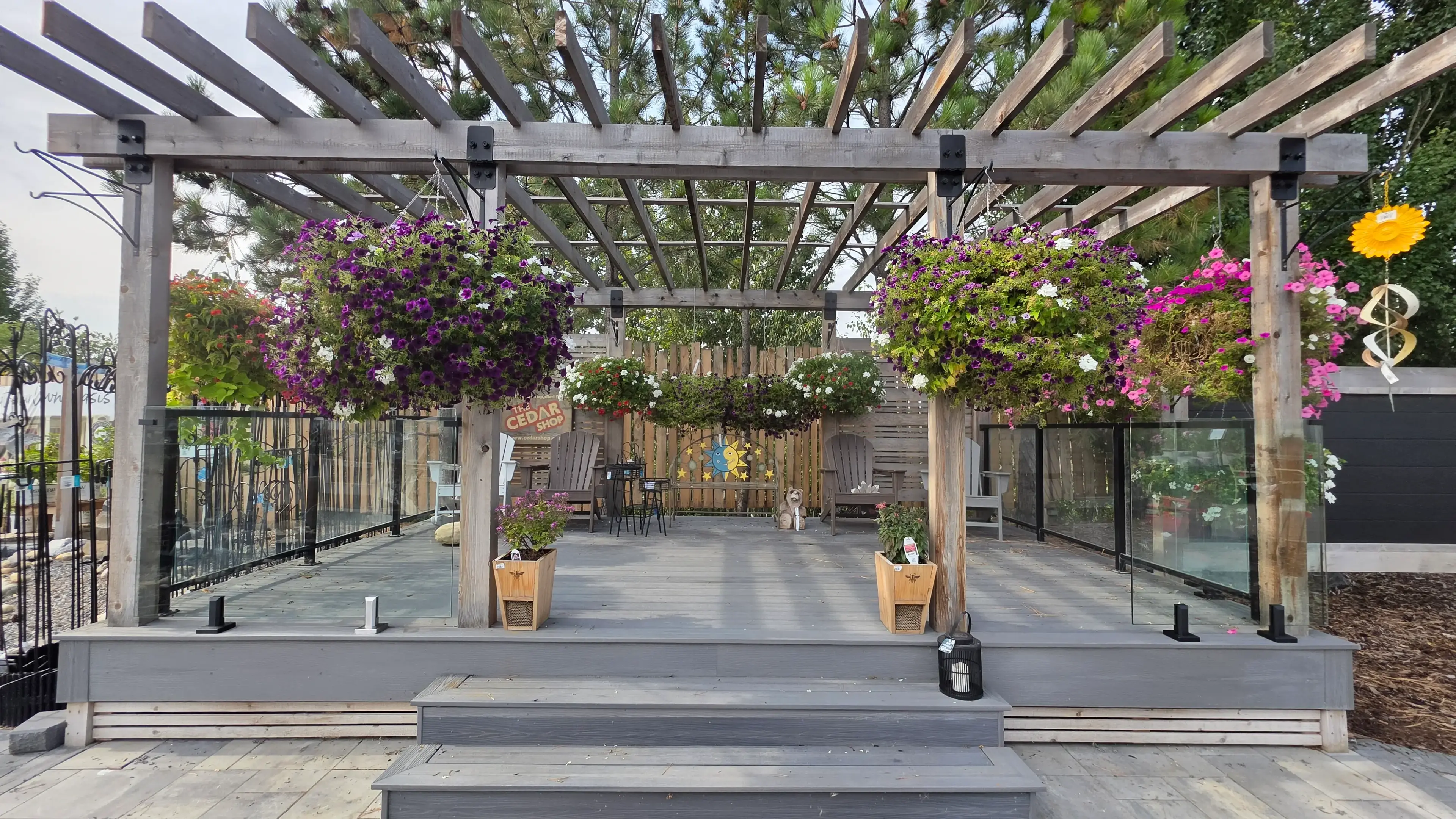 Residential glass railing with polished spigot hardware