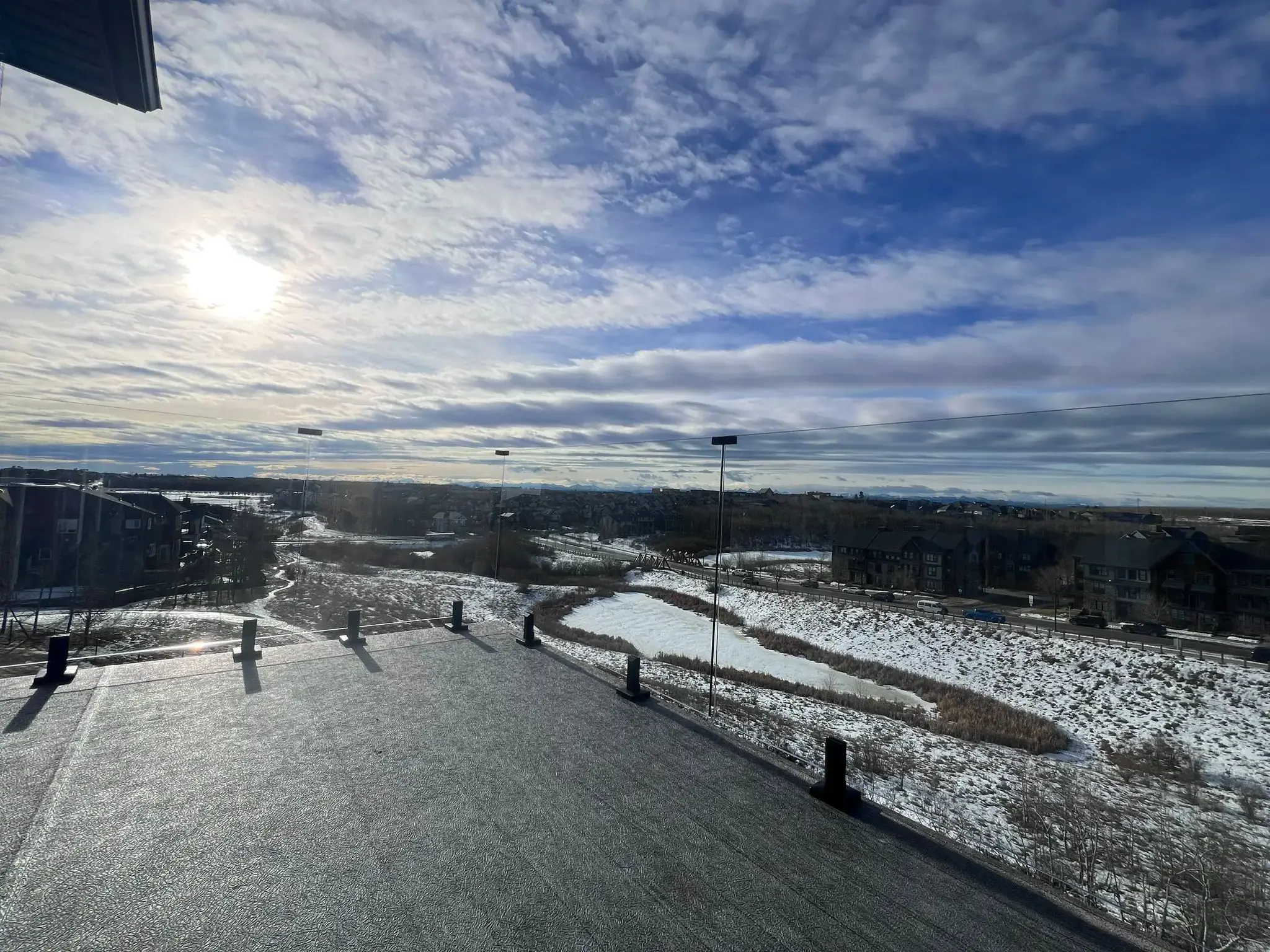 Custom glass railing with spigot mounting on staircase