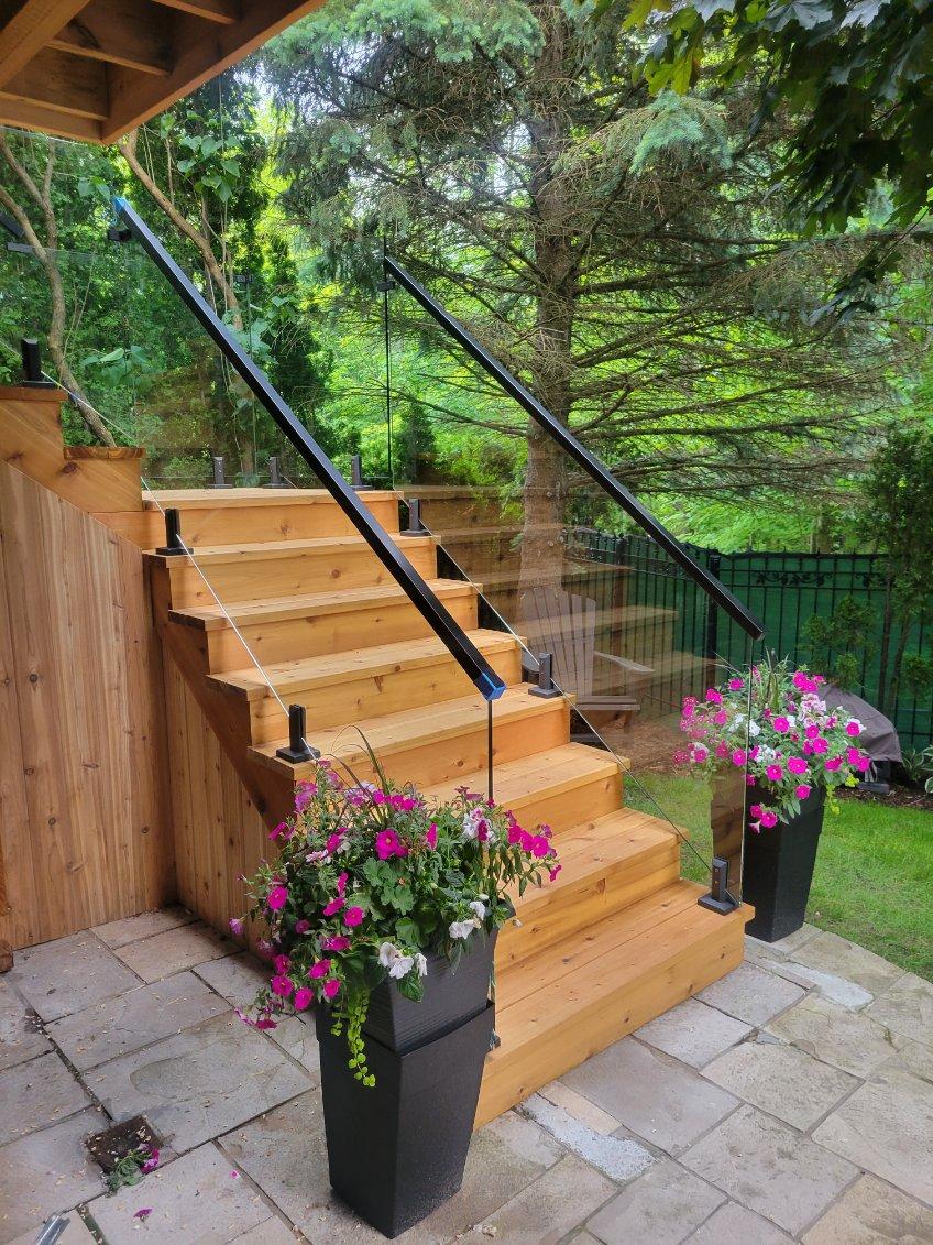 Custom designed mixed-material railing showcasing unique craftsmanship in Calgary home