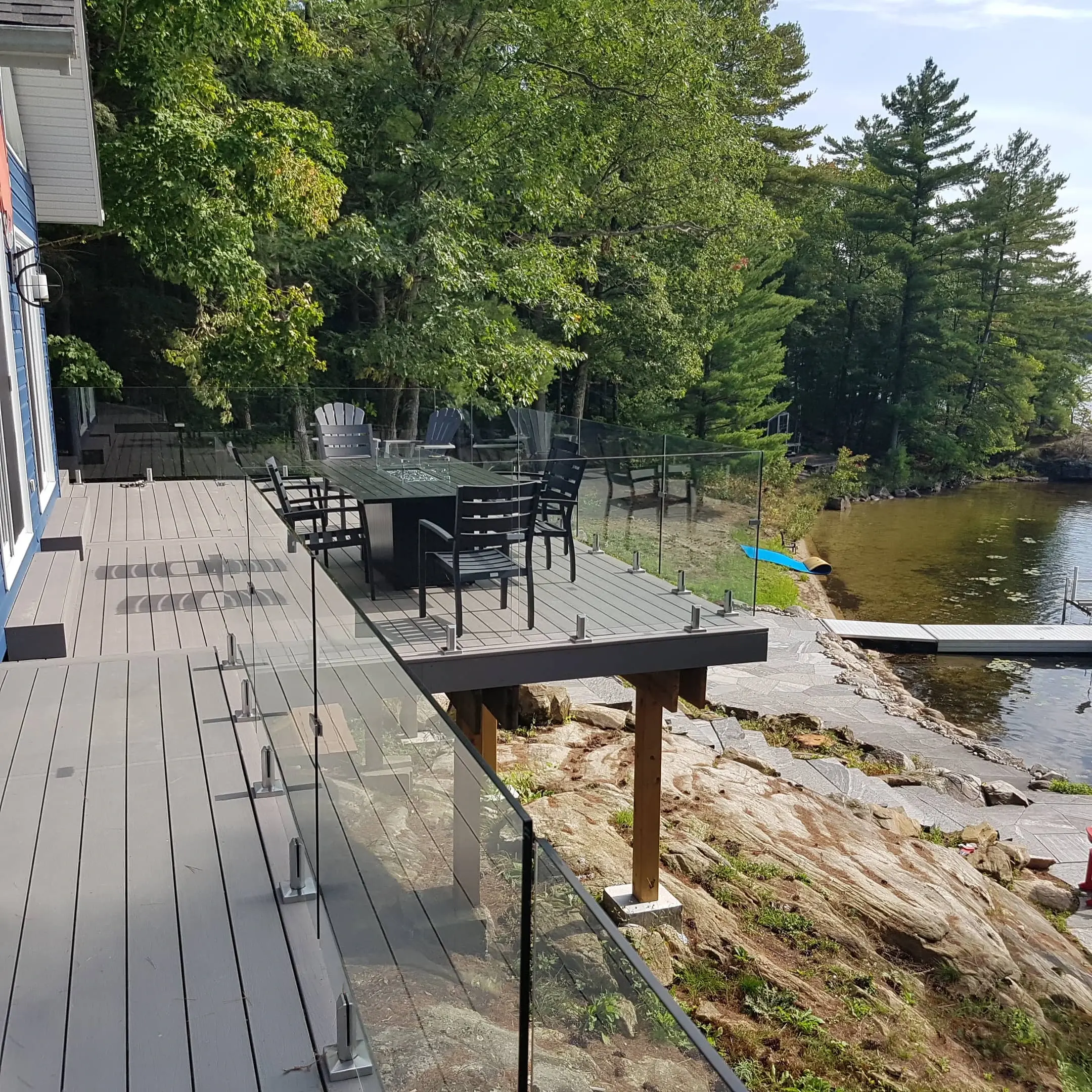 Premium glass railing installation in Calgary home showcasing mountain views